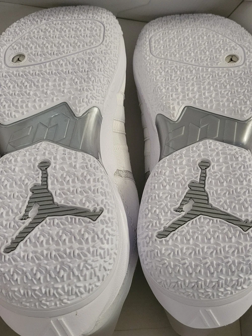 Elevate your rotation with the pristine Jordan Why Not Zer0.4 'Triple White'